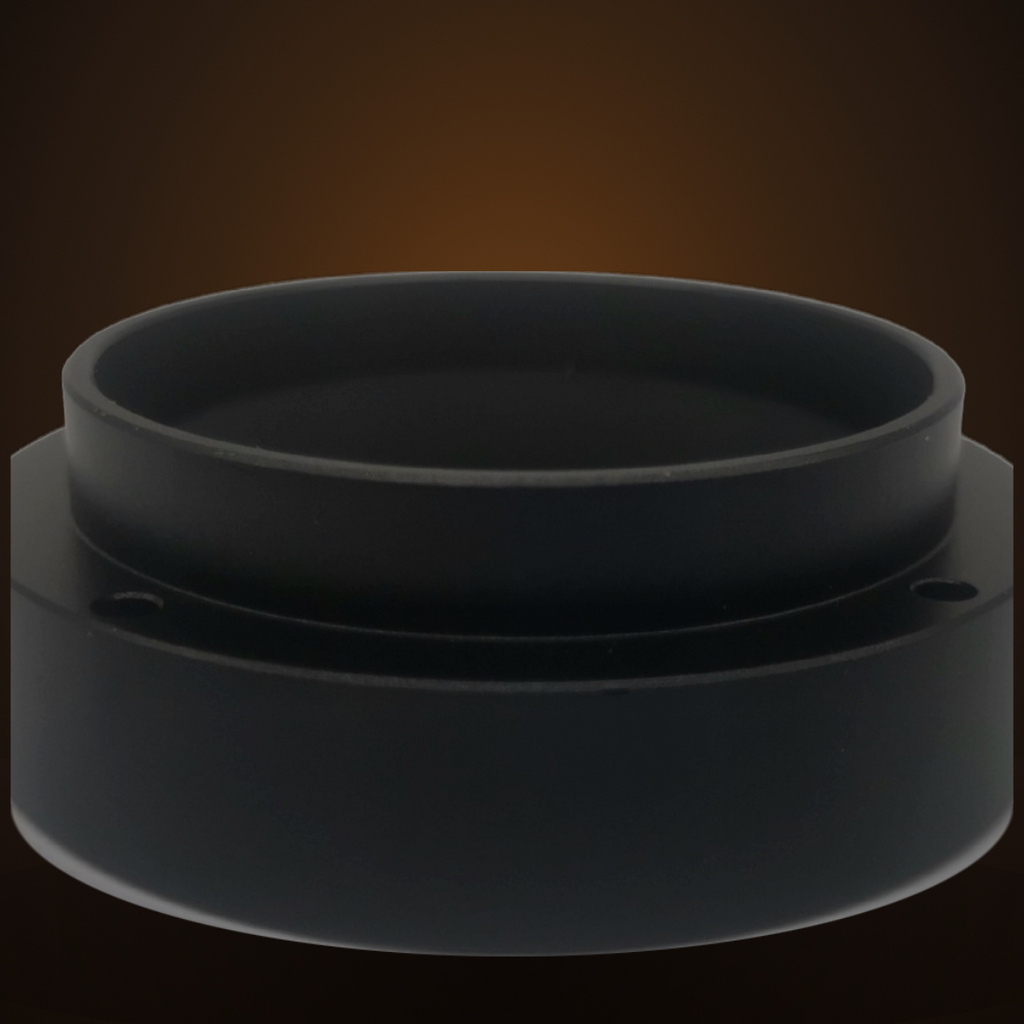 Close-up of the magnetic dosing funnel: stepped black aluminum ring that sits on the portafilter