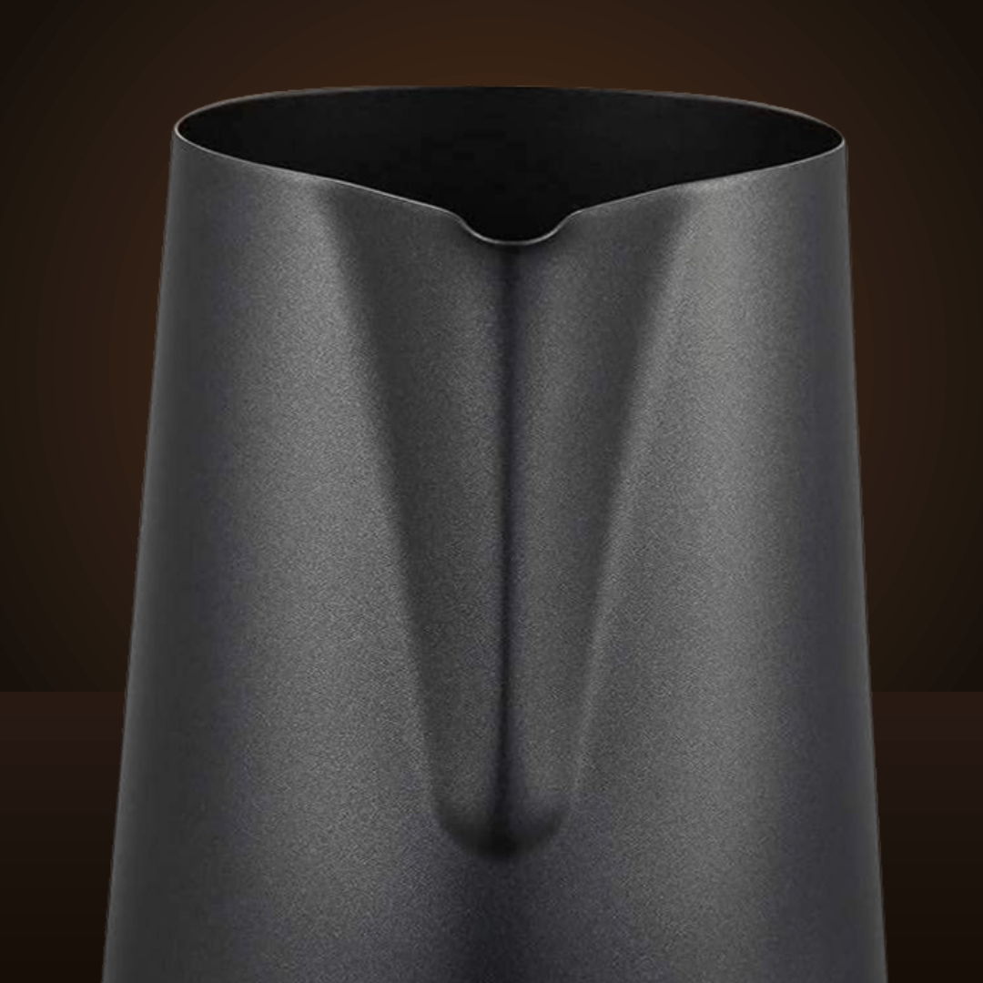 Close-up of the milk pitcher's pointed pouring spout and matte black finish
